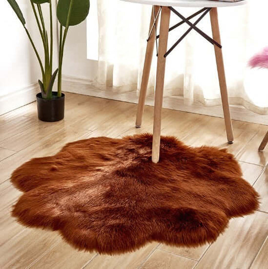 Cozy brown artificial woolen carpet rug adding warmth to a modern living space under a stylish table.