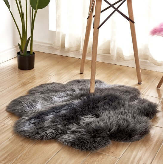 Plush artificial woolen carpet rug in gray tones, perfect for home decor and warmth, enhancing any living space.